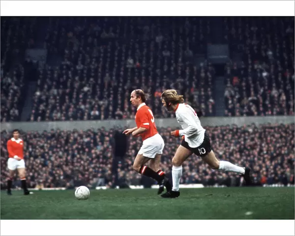 Bobby Charlton on the ball during his last home game for Manchester United