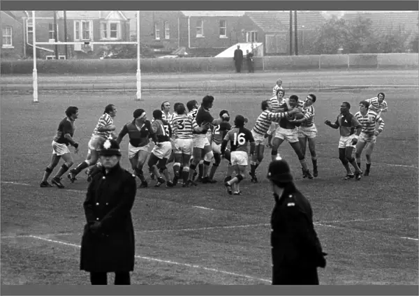 Policemen line the pitch during the South African Barbarians game against Devon in 1979