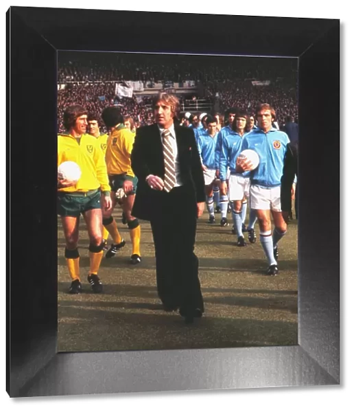 Norwich manager John Bond leads his team out for the 1975 League Cup Final