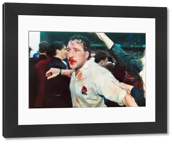 A bloodied Mike Teague celebrates Englands Grand Slam victory - 1991 Five Nations