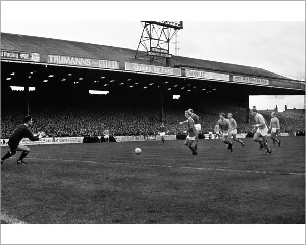 Bobby Charlton scores against Manchester City in 1967
