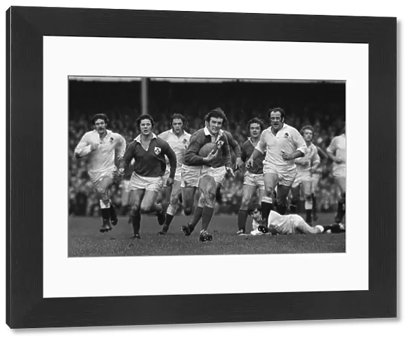 Irelands John Moloney makes a break against England - 1974 Five Nations