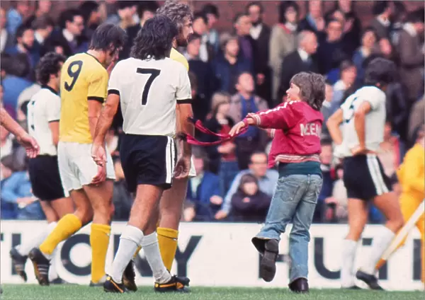 A young fan greets George Best after his debut for Fulham