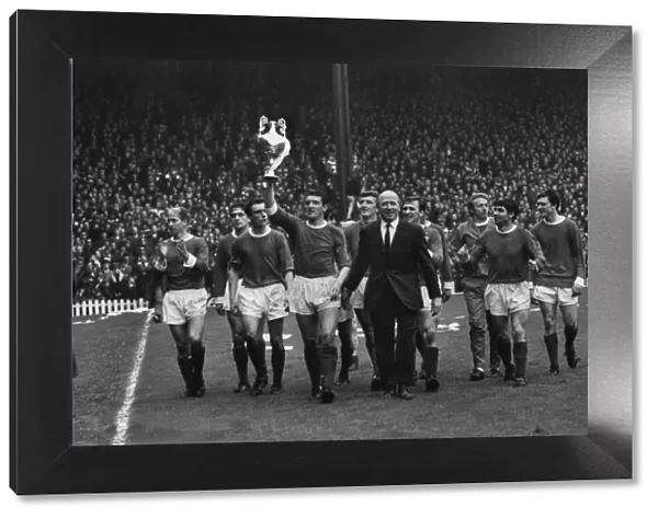 The Manchester United team do a lap of honour with manager Matt Busby after winning the league title in 1967
