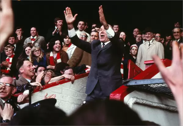Matt Busby says farewell to the Old Trafford fans after his last home game as Manchester United manager