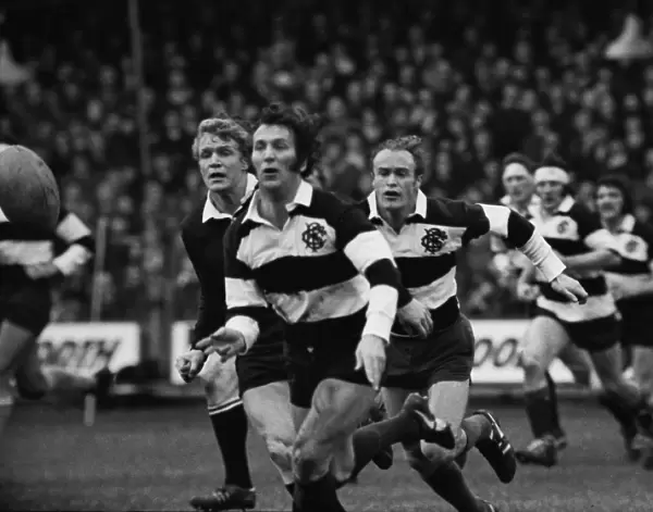 John Dawes and Mike Gibson in action for the Barbarians against the All Blacks in 1973