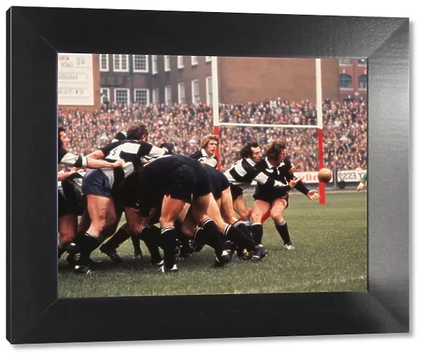 Gareth Edwards tackles Alex Wyllie during the famous game between the All Blacks and Barbarians in 1973