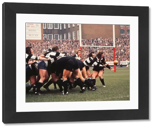 Gareth Edwards tackles Alex Wyllie during the famous game between the All Blacks and Barbarians in 1973