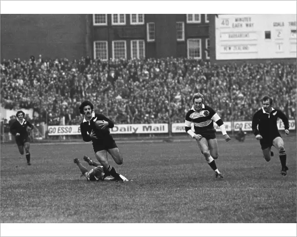 Bryan Williams makes the break for Grant Battys try against the Barbarians in 1973