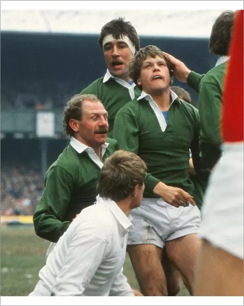 Irelands Trevor Ringland celebrates his try with Nigel Carr and Donal Lenihan - 1986 Five Nations