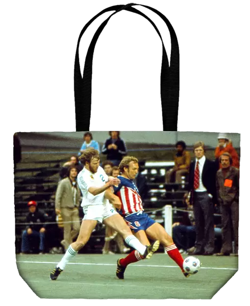 San Antonios Bobby Moore wins the ball from Portlands Ray Martin - 1976 NASL