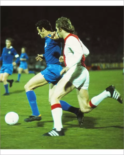 Real Madrids Jose Luis is chased by Ajaxs Piet Keizer