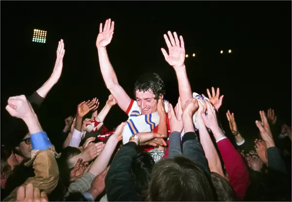 Frank McLintock celebrates with the fans after Arsenal win the 1971 league title