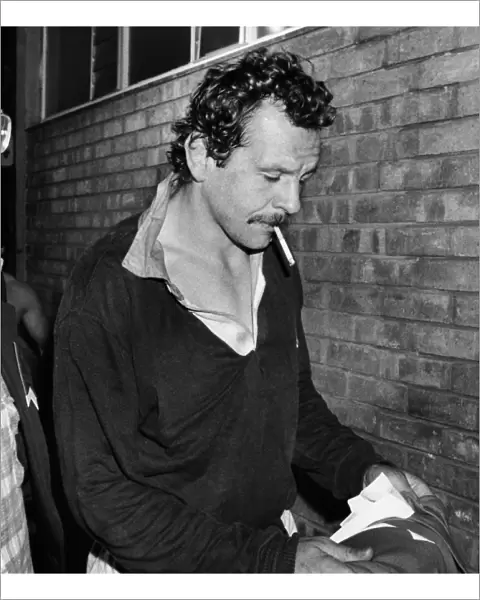 Lions captain Bill Beaumont enjoys a cigarette in the dressing room after victory over South Africa in the 4th Test in 1980