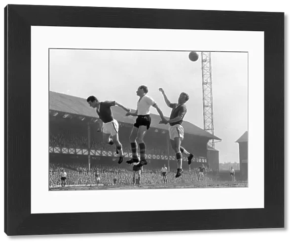 Thomas Ring, Jimmy Ashall and James Harris jump for the ball at Goodison Park