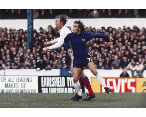 Jack Charlton of Leeds and Tommy Baldwin of Chelsea challenge for the ball