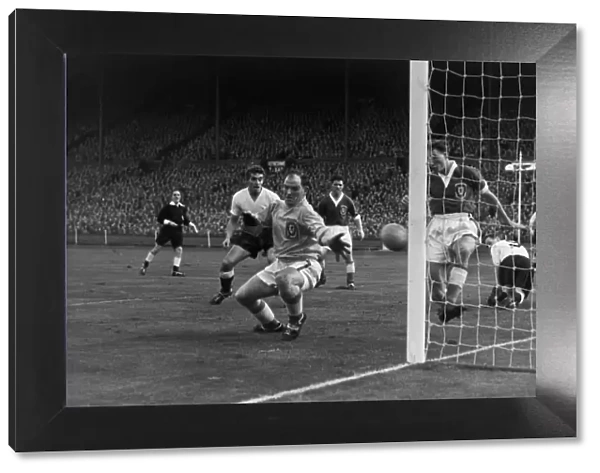 Alfred Sherwood makes a save for Wales - 1956  /  7 British Home Championship