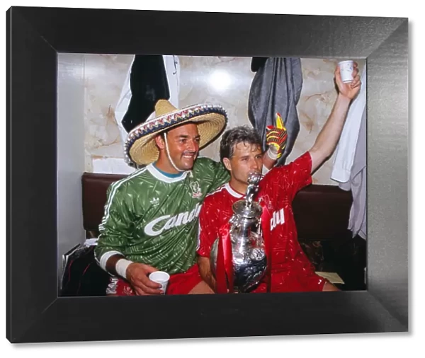 Bruce Grobbelaar and Glenn Hysen celebrate Liverpools 1990 league title