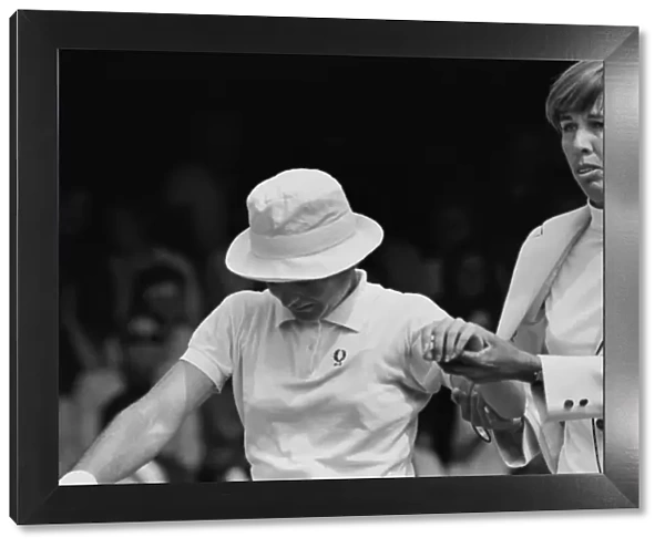 Doris Hart helps the injured Nancy Richey from the court - 1970 Wightman Cup