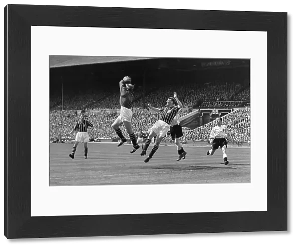 Manchester City goalkeeper Bert Trautmann collects a high ball - 1956 FA Cup Final