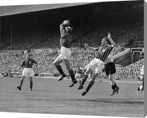 Manchester City goalkeeper Bert Trautmann collects a high ball - 1956 FA Cup Final