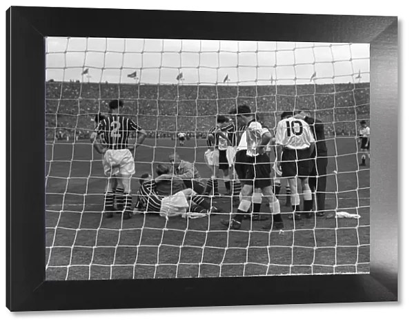 Manchester City goalkeeper Bert Trautmann lies injured - 1956 FA Cup Final