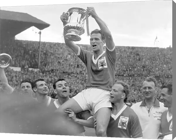 Forest captain Jack Burkitt lifts the trophy - 1959 FA Cup Final