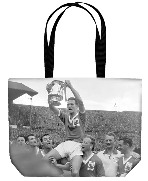 Forest captain Jack Burkitt lifts the trophy - 1959 FA Cup Final