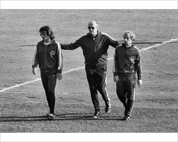 West German manager Helmut Schoen walks with Berti Vogts and Wolfgang Overath - 1974 World Cup