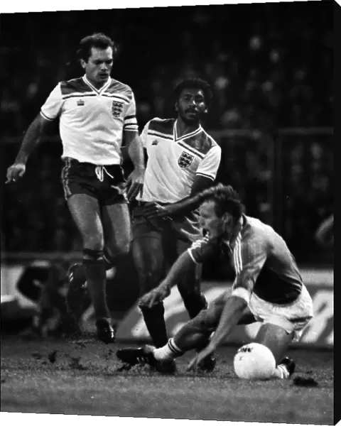 Englands Ray Wilkins and Ricky Hill