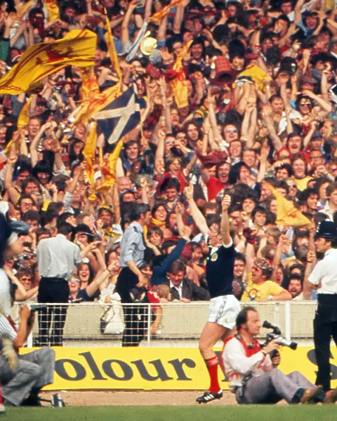 Kenny Dalglish celebrates his goal in front of the Scotland fans at Wembley - 1977 British Home Championship