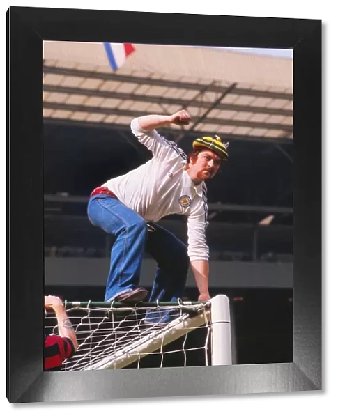 A Scotland fans climbs up the Wembley goalpost - 1977 British Home Championship