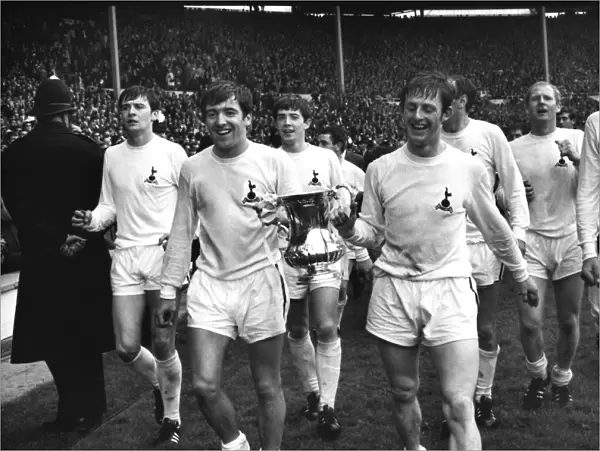 Terry Venables and Jimmy Robertson parade the trophy after Tottenhams 1967 FA Cup victory