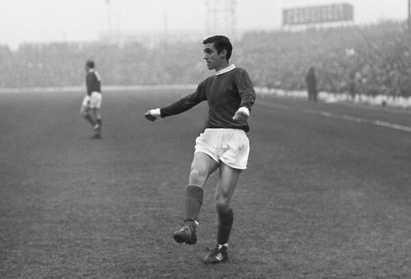 A 17 year-old George Best plays for Manchester United in 1963