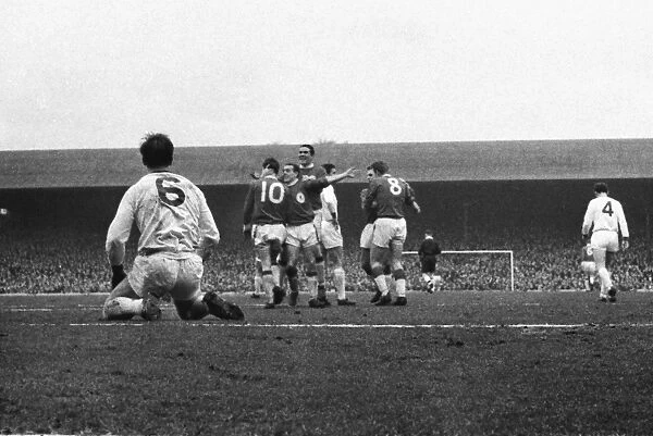 Alf Arrowsmith and his Liverpool teammates celebrate his goal against Manchester United in 1963 / 4