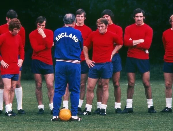 Alf Ramsey talks to his England players