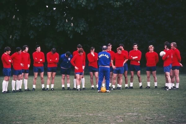 Alf Ramsey talks to his England players