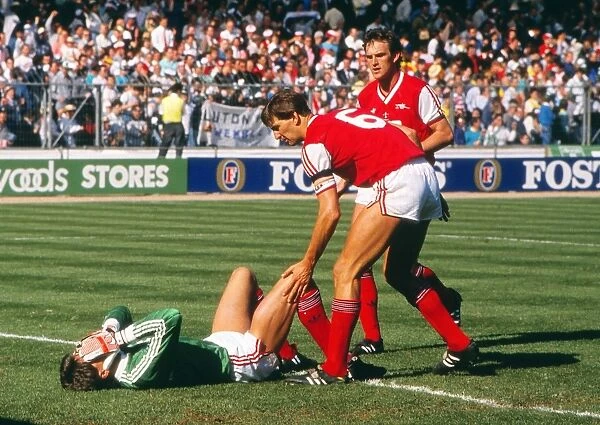 Arsenals Tony Adams and Martin Hayes console goalkeeper John Lukic - 1988 League Cup Final