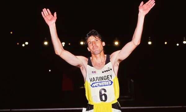 Athletics - McVities meeting at Crystal Palace 1989 - Mens 1500m Sebastian Coe of Great Britain raises his arms to the crowd after running in his last race in the UK before