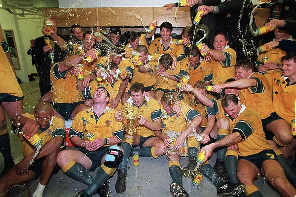 The Australia team celebrate after winning the 1999 Rugby World Cup