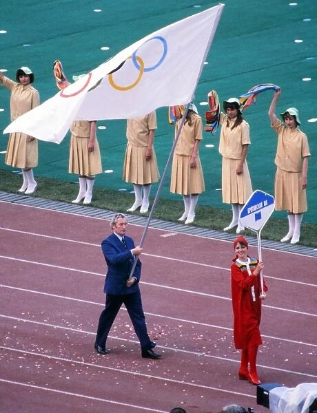 BOA official Dick Palmer carries the Olympic flag for Great Britain during the Opening Ceremony of the 1980 Moscow Olympics