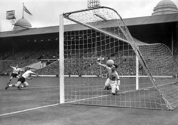 Bobby Charlton scores against Scotland at Wembley in 1959