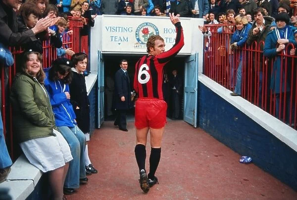 Bobby Moore waves to the crowd after playing his final league game