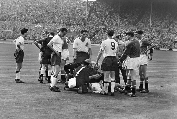 Boltons Dennis Stevens receives medical attention - 1958 FA Cup Final