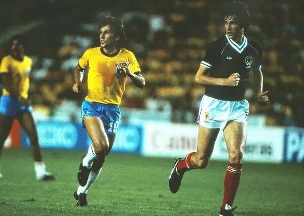 Brazils Zico and Scotlands Alan Hansen during the 1982 World Cup
