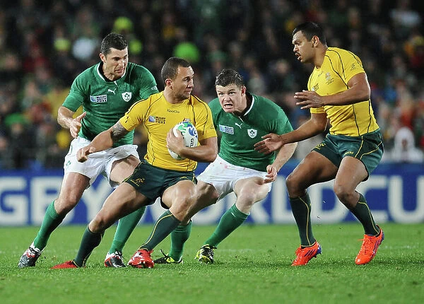 Brian O'Driscoll bears down on Quade Cooper during the 2011 World Cup