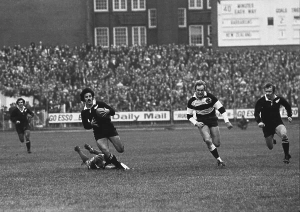Bryan Williams makes the break for Grant Battys try against the Barbarians in 1973