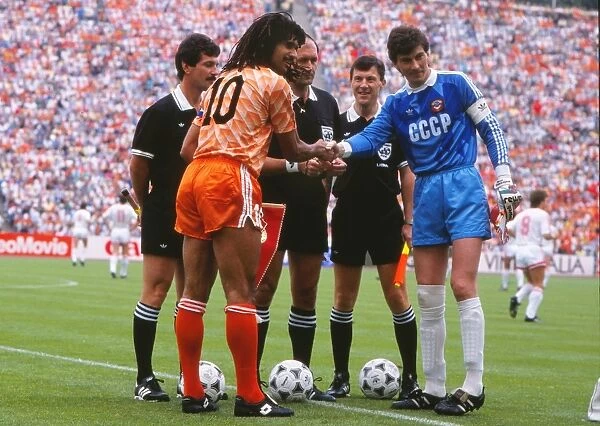 The two captains shake hands before the final of Euro 88