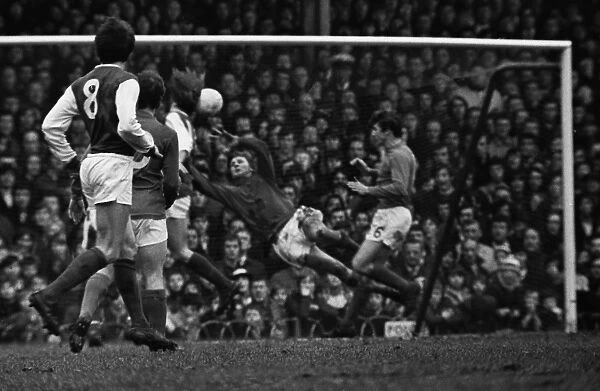 Charlie George scores for Arsenal