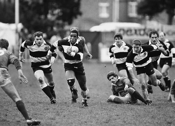 Chris Oti makes a break for the Barbarians in the 1989 Mobbs Memorial Match